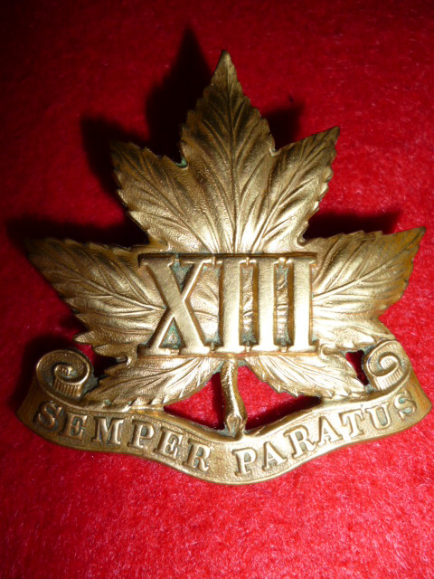 MM79 - 13th Regiment Cap Badge, 1909 Issue